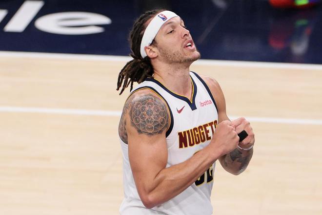 NBA 季后赛掘金与雷霆激战，掘金加时 113 - 104 获胜总比分 2 - 1 领先